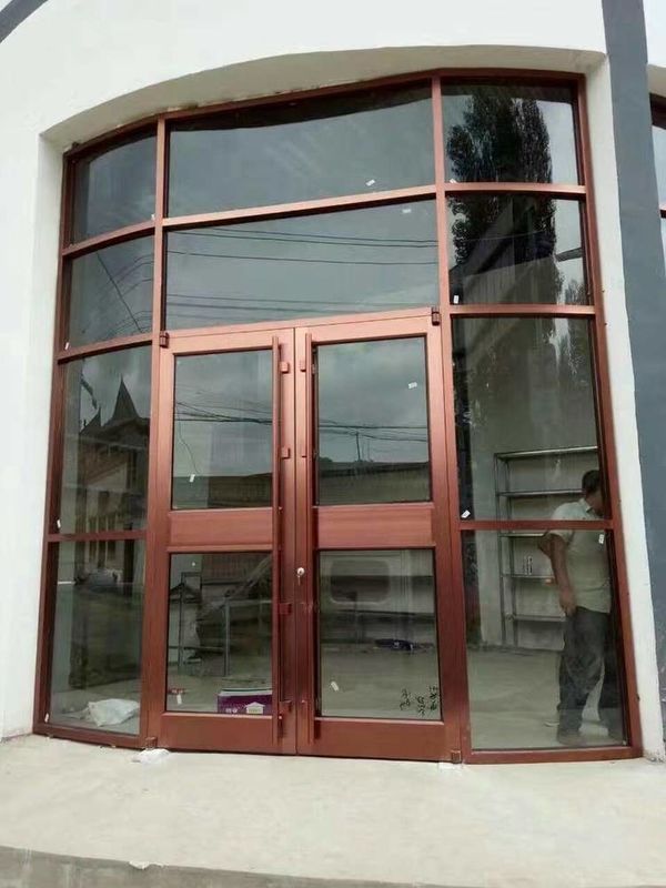 Prix de gros de l'usine Cadre en aluminium devant la boutique Kfc Porte plancher Printemps tempéré Sécurité Porte double verre
