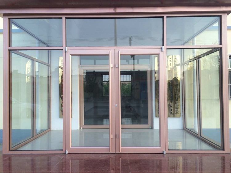 Porte à ressort automatique en acier inoxydable en aluminium extérieur Porte à ressort à double étage Porte à balancer automatique 72x96 ODM