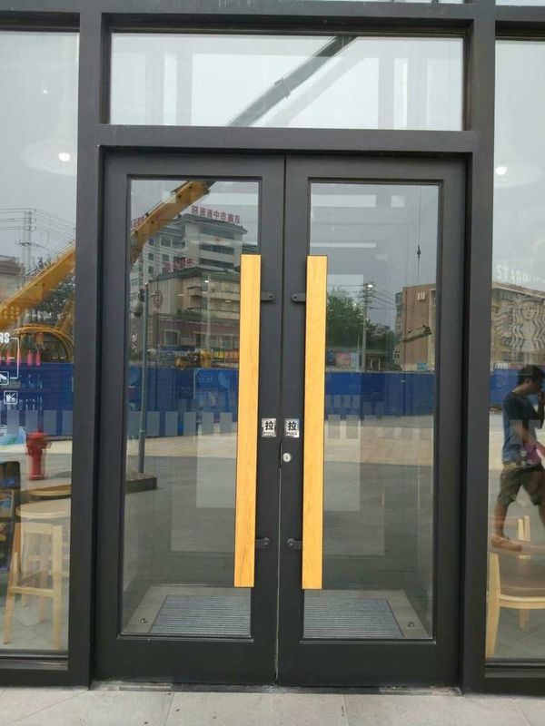 Porte à ressort automatique en acier inoxydable en aluminium extérieur Porte à ressort à double étage Porte à balancer automatique 72x96 ODM