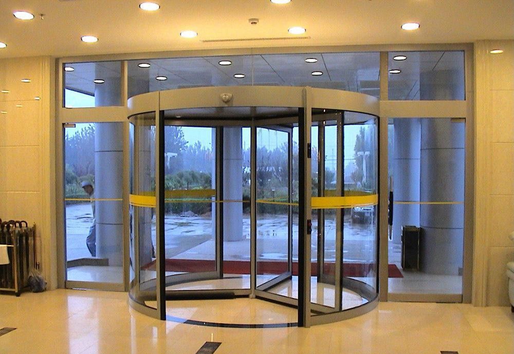 Tailles standard et personnalisées Porte tournante automatique avec finition en acier inoxydable